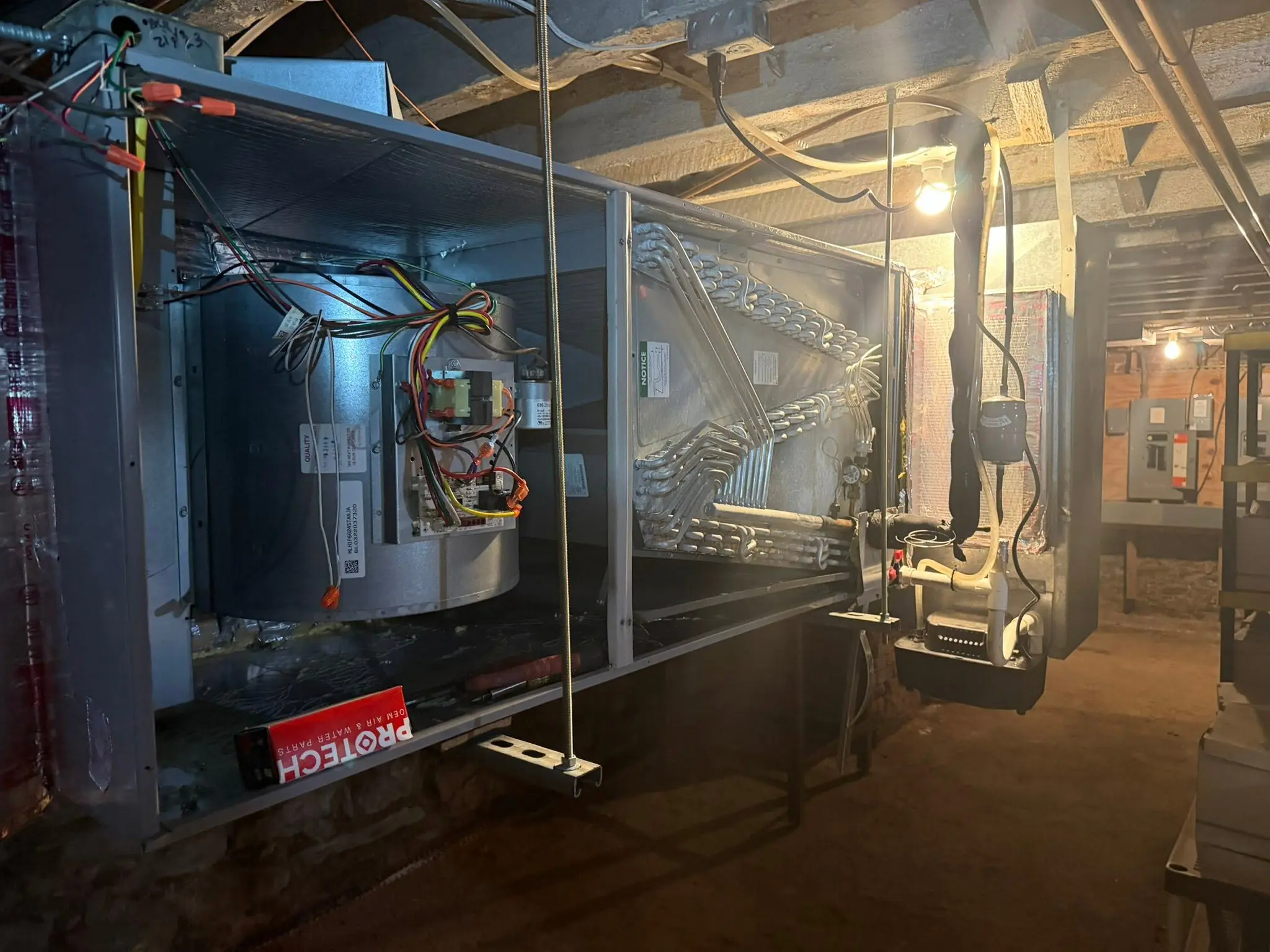 Open air handler during blower motor service